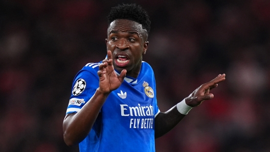 LISBON, PORTUGAL - FEBRUARY 17: Vinicius Junior of Real Madrid reacts during the UEFA Champions League 2025/26 League Knockout Play-off First Leg match between SL Benfica and Real Madrid C.F. at Estadio do SL Benfica on February 17, 2026 in Lisbon, Portugal. (Photo by Angel Martinez/Getty Images)