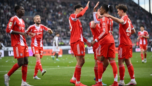  Michael Olise of FC Bayern Munich celebrates scoring his team's third goal  during the Bundesliga match between FC St. Pauli and FC Bayern MÃ¼nchen at Millerntor Stadium on April 11, 2026 in Hamburg, Germany. (Photo by Stuart Franklin/Getty Images)