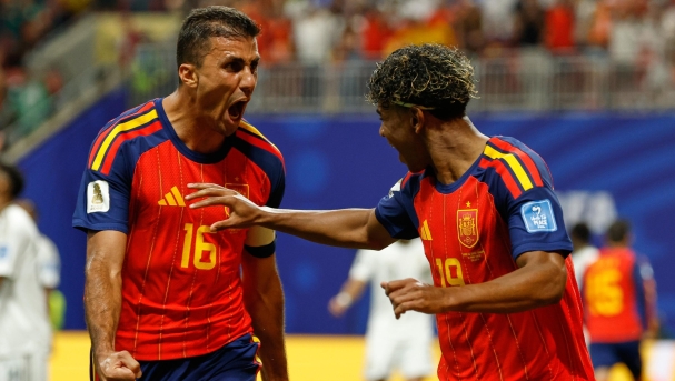 Spain's Lamine Yamal celebrates with teammate Rodri, left, after scoring his side's opening goal during the World Cup Group H soccer match between Spain and Saudi Arabia in Atlanta, Sunday, June 21, 2026. (AP Photo/Erik S.Lesser)