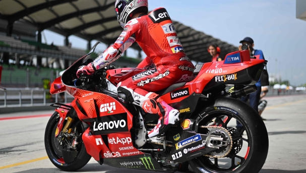 Ducati Lenovo Team's Italian rider Enea Bastianini leaves the pit lane during the first day of the pre-season MotoGP test at the Sepang International Circuit in Sepang on February 6, 2024. (Photo by Mohd RASFAN / AFP)