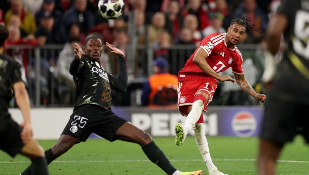  Michael Olise of FC Bayern Munich shoots while under pressure from Nuno Mendes of Paris Saint-Germain during the UEFA Champions League 2025/26 Semi Final Second Leg match between FC Bayern MÃ¼nchen and Paris Saint-Germain at Football Arena Munich on May 06, 2026 in Munich, Germany. (Photo by Adam Pretty/Getty Images)