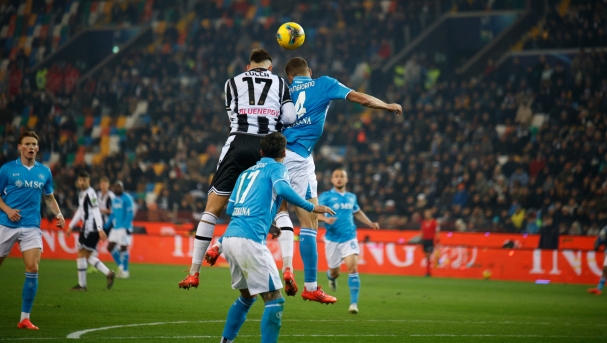 Lorenzo Lucca of Udinese is hindered by Alessandro Buongiorno of Napoli during the Italian Serie A Enilive soccer championship match between Udinese Calcio and SSC Napoli at Bluenergy Stadium in Udine, Italy, on December 14, 2024. (Photo by Mattia Radoni/NurPhoto) (Photo by Mattia Radoni / NurPhoto via AFP)