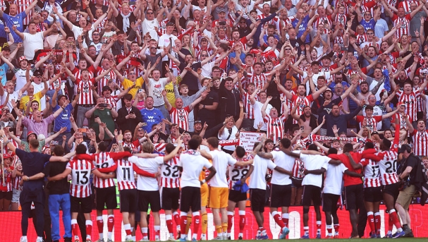  Fans of Sunderland celebrate with the players following the Premier League match between Sunderland and Chelsea at the Stadium of Light on May 24, 2026 in Sunderland, England. (Photo by George Wood/Getty Images)