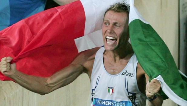 Stefano Baldini trionfatore all'Olimpiade di Atene 2004. Ap