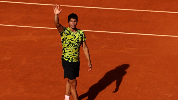 MADRID, SPAIN - MAY 05: Carlos Alcaraz of Spain acknowledges the crowd after match point against Borna Coric of Croatia during the Men's Singles Semi-Final match on Day Twelve of the Mutua Madrid Open at La Caja Magica on May 05, 2023 in Madrid, Spain. (Photo by Clive Brunskill/Getty Images)