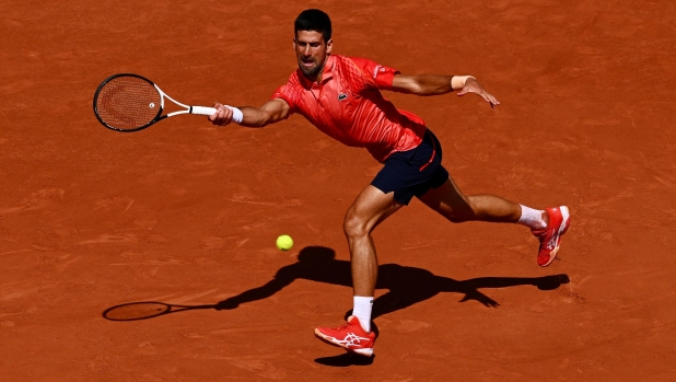 PARIS, FRANCE - MAY 29: Novak Djokovic of Serbia plays a forehand against Aleksandar Kovacevic of United States during their Men's Singles First Round Match on Day Two of the 2023 French Open at Roland Garros on May 29, 2023 in Paris, France. (Photo by Clive Mason/Getty Images) *** BESTPIX ***