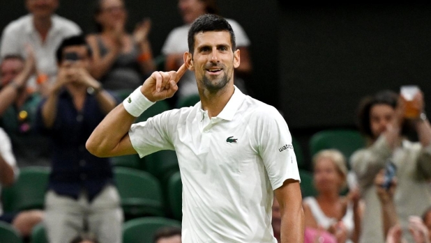 LONDON, ENGLAND - JULY 07: Novak Djokovic of Serbia celebrates against Stan Wawrinka of Switzerland in the Men's Singles third round match during day five of The Championships Wimbledon 2023 at All England Lawn Tennis and Croquet Club on July 07, 2023 in London, England. (Photo by Shaun Botterill/Getty Images)
