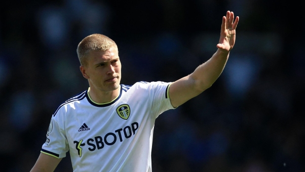 Leeds United's Danish defender Rasmus Kristensen waves at supporters at the end of the English Premier League football match between Leeds United and Newcastle United at Elland Road in Leeds, northern England on May 13, 2023. (Photo by Lindsey Parnaby / AFP) / RESTRICTED TO EDITORIAL USE. No use with unauthorized audio, video, data, fixture lists, club/league logos or 'live' services. Online in-match use limited to 120 images. An additional 40 images may be used in extra time. No video emulation. Social media in-match use limited to 120 images. An additional 40 images may be used in extra time. No use in betting publications, games or single club/league/player publications. /