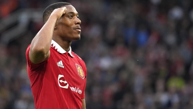 Manchester United's Anthony Martial celebrates after scoring his side's second goal during the English Premier League soccer match between Manchester United and Chelsea at the Old Trafford stadium in Manchester, England, Thursday, May 25, 2023. (AP Photo/Dave Thompson)