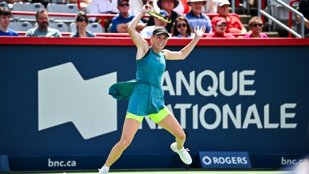 MONTREAL, CANADA - AUGUST 08: Caroline Wozniacki of Denmark hits a return against Kimberly Birrell of Australia on Day 2 during the National Bank Open at Stade IGA on August 8, 2023 in Montreal, Canada.   Minas Panagiotakis/Getty Images/AFP (Photo by Minas Panagiotakis / GETTY IMAGES NORTH AMERICA / Getty Images via AFP)