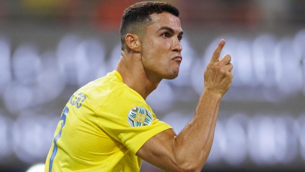 Nassr's Portuguese forward #07 Cristiano Ronaldo celebrates scoring his team's first goal during the 2023 Arab Club Champions Cup final football match between Saudi Arabia's Al-Hilal and Al-Nassr at the King Fahd Stadium in Taif on August 12, 2023. (Photo by AFP)
