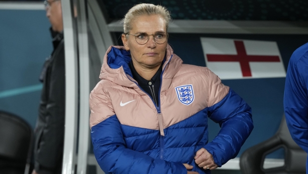 England's head coach Sarina Wiegman stands by the bench before the start of the Women's World Cup quarterfinal soccer match between England and Colombia at Stadium Australia in Sydney, Australia, Saturday, Aug. 12, 2023. (AP Photo/Rick Rycroft)