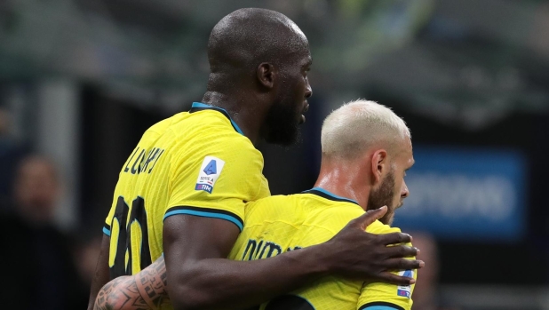 MILAN, ITALY - MAY 13: Romelu Lukaku of FC Internazionale celebrates with Federico Dimarco after scoring their team's first goal during the Serie A match between FC Internazionale and US Sassuolo at Stadio Giuseppe Meazza on May 13, 2023 in Milan, Italy. (Photo by Emilio Andreoli - Inter/Inter via Getty Images)