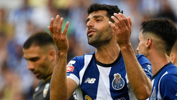 FC Porto's Iranian forward #09 Mehdi Taremi reacts during the Portuguese league football match between FC Porto and SC Farense at the Dragao stadium in Porto on August 20, 2023. (Photo by MIGUEL RIOPA / AFP)