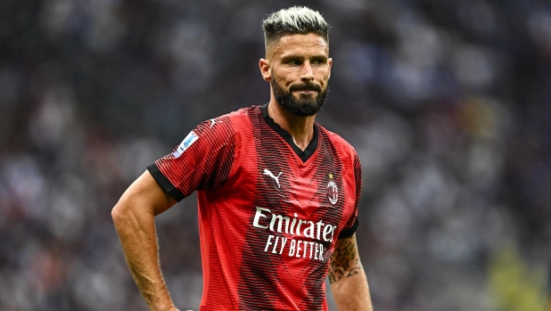 AC Milan's French forward #09 Olivier Giroud reacts during the Italian Serie A football match between Inter Milan and AC Milan at the San Siro Stadium in Milan on September 16, 2023. (Photo by GABRIEL BOUYS / AFP)