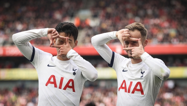 LONDON, ENGLAND - SEPTEMBER 24: Heung-Min Son of Tottenham Hotspur celebrates with James Maddison of Tottenham Hotspur after scoring his teams second goal during the Premier League match between Arsenal FC and Tottenham Hotspur at Emirates Stadium on September 24, 2023 in London, England. (Photo by Ryan Pierse/Getty Images)