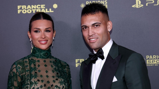 epa10949399 Inter Milan and Argentine international forward Lautaro Martinez (R) and partner Agustina Gandolfo arrive for the Ballon d'Or 2023 ceremony at the Theatre du Chatelet in Paris, France, 30 October 2023.  EPA/MOHAMMED BADRA