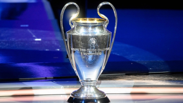 This photograph taken on August 31, 2023, shows the UEFA Champions League football trophy cup during the draw for the UEFA Champions League football tournament 2023-2024 at The Grimaldi Forum in the Principality of Monaco. (Photo by NICOLAS TUCAT / AFP)