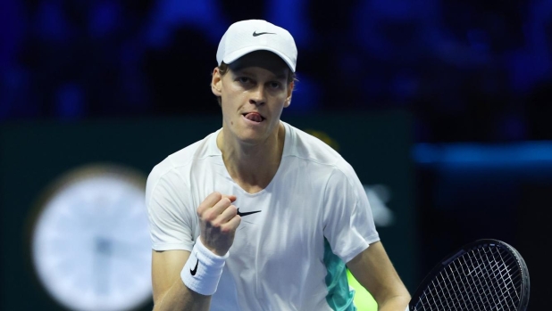 TURIN, ITALY - NOVEMBER 12: Jannik Sinner of Italy reacts against Stefanos Tsitsipas of Greece during their Men's Single's Nitto ATP Finals match during day one of the Nitto ATP Finals at Pala Alpitour on November 12, 2023 in Turin, Italy. (Photo by Clive Brunskill/Getty Images)