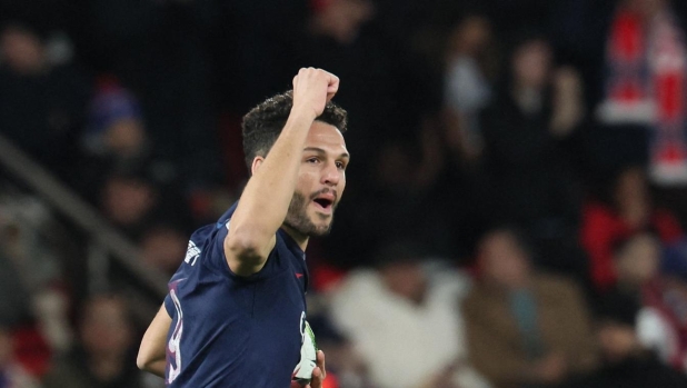 Paris Saint-Germain's Portuguese forward #09 Goncalo Ramos (C) celebrates after scoring PSG's first goal during the French L1 football match between Paris Saint-Germain (PSG) and Lille LOSC at the Parc des Princes stadium in Paris, on February 10, 2024. (Photo by ALAIN JOCARD / AFP)