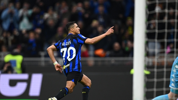 MILAN, ITALY - MARCH 04: Alexis Sanchez of FC Internazionale celebrates after scoring his team's second goal during the Serie A TIM match between FC Internazionale and Genoa CFC - Serie A TIM  at Stadio Giuseppe Meazza on March 04, 2024 in Milan, Italy. (Photo by Mattia Ozbot - Inter/Inter via Getty Images)