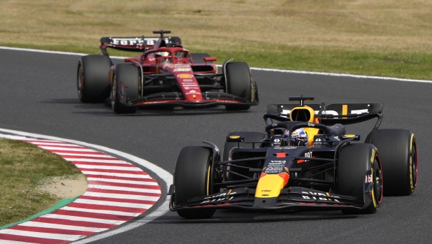 epa11263531 Red Bull Racing driver Max Verstappen of Netherlands (front) and Scuderia Ferrari driver Charles Leclerc of Monaco in action during the Formula One Japanese Grand Prix at the Suzuka International Racing Course in Suzuka, Japan, 07 April 2024.  EPA/FRANCK ROBICHON