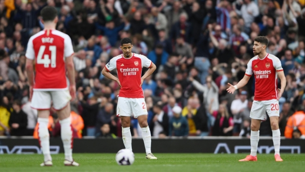 epa11278679 (L-R) Arsenalâ??s Declan Rice, William Saliba and Jorginho discuss as Aston Villa score their second goal during the English Premier League soccer match between Arsenal FC and Aston Villa, in London, Britain, 14 April 2024.  EPA/DANIEL HAMBURY EDITORIAL USE ONLY. No use with unauthorized audio, video, data, fixture lists, club/league logos, 'live' services or NFTs. Online in-match use limited to 120 images, no video emulation. No use in betting, games or single club/league/player publications.