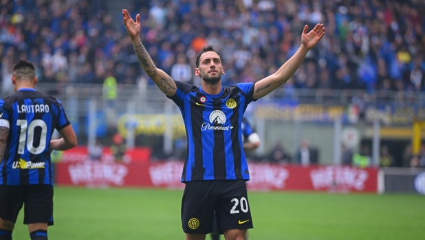 MILAN, ITALY - APRIL 28:  Hakan Calhanoglu of FC Internazionale celebrates after scoring the second goal during the Serie A TIM match between FC Internazionale and Torino FC at Stadio Giuseppe Meazza on April 28, 2024 in Milan, Italy. (Photo by Mattia Pistoia - Inter/Inter via Getty Images) (Photo by Mattia Pistoia - Inter/Inter via Getty Images)