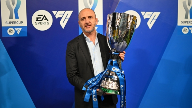 RIYADH, SAUDI ARABIA - JANUARY 22: Piero Ausilio of FC Internazionale poses with the trophy at the end of the Italian EA Sports FC Supercup Final match between SSC Napoli and FC Internazionale at Al-Awwal Stadium on January 22, 2024 in Riyadh, Saudi Arabia. (Photo by Mattia Ozbot - Inter/Inter via Getty Images)