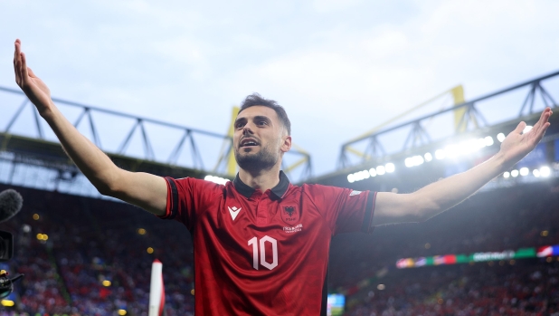 DORTMUND, GERMANY - JUNE 15: Nedim Bajrami of Albania celebrates scoring his team's first goal  during the UEFA EURO 2024 group stage match between Italy and Albania at Football Stadium Dortmund on June 15, 2024 in Dortmund, Germany. (Photo by Dean Mouhtaropoulos/Getty Images)