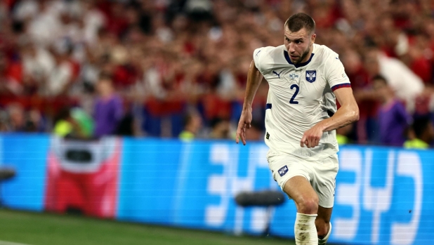 epa11437661 Strahinja Pavlovic of Serbia in action during the UEFA EURO 2024 Group C soccer match between Denmark and Serbia, in Munich, Germany, 25 June 2024.  EPA/ANNA SZILAGYI