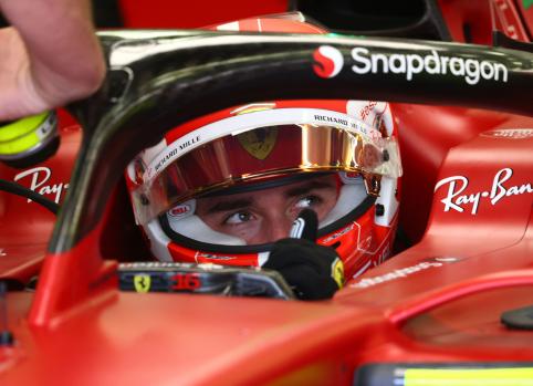Ferrari's Monegasque driver Charles Leclerc sits in his car during the second day of Formula One (F1) pre-season testing at the Bahrain International Circuit in the city of Sakhir on March 11, 2022. (Photo by Giuseppe CACACE / AFP)