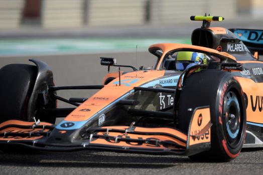 McLaren's British driver Lando Norris drives during the third day of Formula One (F1) pre-season testing at the Bahrain International Circuit in the city of Sakhir on March 12, 2022. (Photo by Mazen Mahdi / AFP)