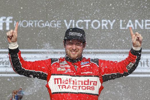 AVONDALE, ARIZONA - MARCH 13: Chase Briscoe, driver of the #14 Mahindra Tractors Ford, celebrates in victory lane after winning the the Ruoff Mortgage 500 at Phoenix Raceway on March 13, 2022 in Avondale, Arizona.   Sean Gardner/Getty Images/AFP == FOR NEWSPAPERS, INTERNET, TELCOS & TELEVISION USE ONLY ==