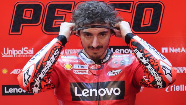 Ducati Lenovo Team's Italian rider Francesco Bagnaia looks on after the second free practice session ahead of the Moto GP Grand Prix of Qatar at the Lusail International Circuit, in the city of Lusail on March 5, 2022. (Photo by KARIM JAAFAR / AFP)