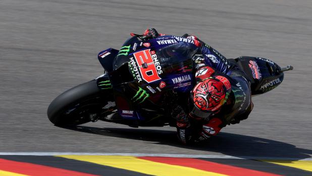 Monster Energy Yamaha's French rider Fabio Quartararo steers his motorbike during the third free practice for the MotoGP German motorcycle Grand Prix at the Sachsenring racing circuit in Hohenstein-Ernstthal near Chemnitz, eastern Germany, on June 18, 2022. (Photo by Ronny Hartmann / AFP)