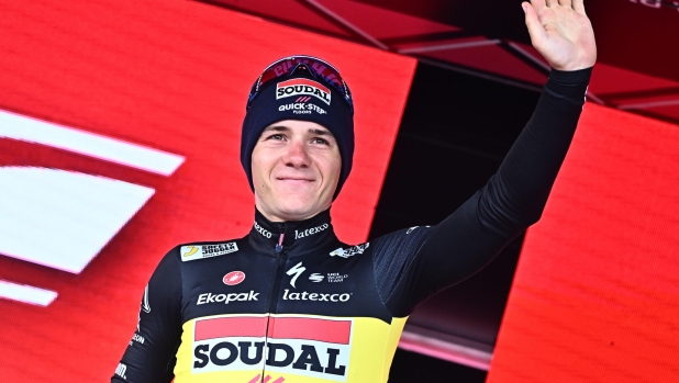 Belgian rider Remco Evenepoel of team Soudal Quick-Step celebrate on the podium after winnig the ninth stage ITT crono of the 2023 Giro d'Italia cycling race over 35 km from Savignano sul Rubicone to Cesena, Italy, 14 May 2023. ANSA/LUCA ZENNARO
