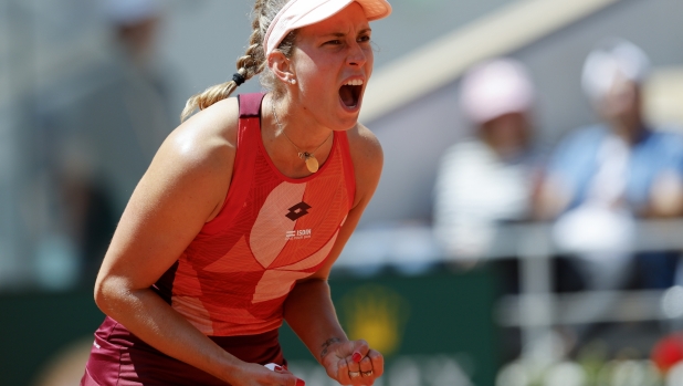 Belgium's Elise Mertens reacts after beating Jessica Pegula of the U.S. during their third round match of the French Open tennis tournament at the Roland Garros stadium in Paris, Friday, June 2, 2023. (AP Photo/Jean-Francois Badias)