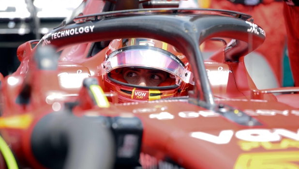 Ferrari's Spanish driver Carlos Sainz Jr sits in his car prior to the Spanish Formula One Grand Prix race at the Circuit de Catalunya on June 4, 2023 in Montmelo, on the outskirts of Barcelona. (Photo by Josep LAGO / AFP)