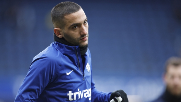 Chelsea's Hakim Ziyech warms up before the English Premier League soccer match between Chelsea and Leeds United at at the Stamford Bridge stadium in London, Saturday, March 4, 2023. (AP Photo/David Cliff)