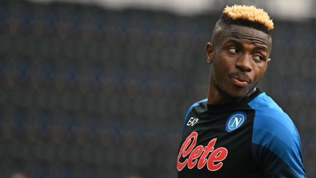Napoli's Nigerian forward Victor Osimhen warms up prior to the Italian Serie A football match between Napoli and Sampdoria on June 4, 2023 at the Diego-Maradona stadium in Naples. (Photo by Tiziana FABI / AFP)