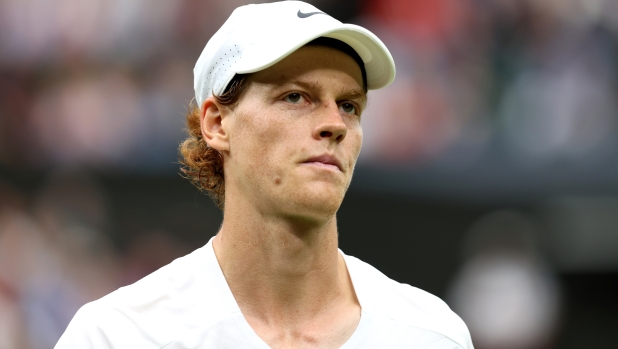 LONDON, ENGLAND - JULY 14: Jannik Sinner of Italy reacts during the Men's Singles Semi Final against Novak Djokovic of Serbia on day twelve of The Championships Wimbledon 2023 at All England Lawn Tennis and Croquet Club on July 14, 2023 in London, England. (Photo by Clive Brunskill/Getty Images)