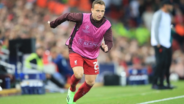 Liverpool's Brazilian midfielder Arthur Melo warms up during the UEFA Champions League group A football match between Liverpool and Ajax at Anfield in Liverpool, north west England on September 13, 2022. (Photo by Lindsey Parnaby / AFP)