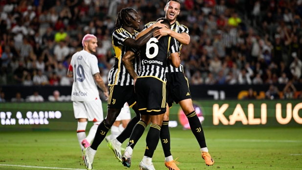 CARSON, CALIFORNIA - JULY 27: Danilo #6 (C) of Juventus celebrates with Moise Kean (L) and Federico Gatti after scoring a goal during the pre-season friendly match against AC Milan at Dignity Health Sports Park on July 27, 2023 in Carson, California. (Photo by Daniele Badolato - Juventus FC/Juventus FC via Getty Images)