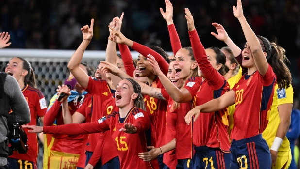 Spains players celebrate after winning the Australia and New Zealand 2023 Women's World Cup final football match between Spain and England at Stadium Australia in Sydney on August 20, 2023. (Photo by WILLIAM WEST / AFP)