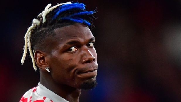 (FILES) A picture taken on September 29, 2021 shows Manchester United's French midfielder Paul Pogba at Old Trafford stadium in Manchester. Juventus and France midfielder Paul Pogba has been provisionally suspended after a doping control detected the banned substance testosterone, Italian anti-doping authorities (NADO) told AFP on September 11, 2023. (Photo by Anthony Devlin / AFP)