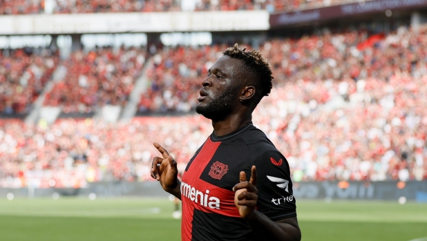 epa10835801 Victor Boniface of Leverkusen celebrates after scoring the opening goal in the German Bundesliga soccer match between Bayer Leverkusen and SV Darmstadt 98 in Leverkusen, Germany, 02 September 2023.  EPA/Ronald Wittek CONDITIONS - ATTENTION: The DFL regulations prohibit any use of photographs as image sequences and/or quasi-video.