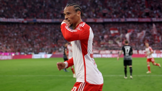 MUNICH, GERMANY - OCTOBER 08: Leroy Sane of FC Bayern München celebrates whilst kissing his ring during the Bundesliga match between FC Bayern München and Sport-Club Freiburg at Allianz Arena on October 08, 2023 in Munich, Germany. (Photo by Alexander Hassenstein/Getty Images)