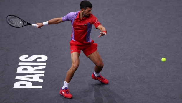 PARIS, FRANCE - NOVEMBER 01:  Novak Djokovic of Serbia returns a forehand in his match against Tomas Martin Etcheverry of Argentina during Day Three of the Rolex Paris Masters ATP Masters 1000 at Palais Omnisports de Bercy on November 01, 2023 in Paris, France. (Photo by Dean Mouhtaropoulos/Getty Images)