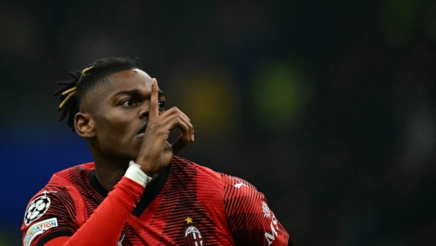 AC Milan's Portuguese forward #10 Rafael Leao celebrates after scoring the team's first goal during the UEFA Champions League 1st round group F football match between AC Milan and Paris Saint-Germain at the San Siro stadium in Milan on November 7, 2023. (Photo by GABRIEL BOUYS / AFP)